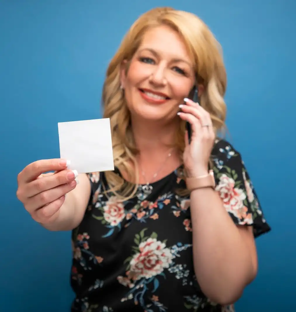 Linette Moore speaking with a mortgage client by phone